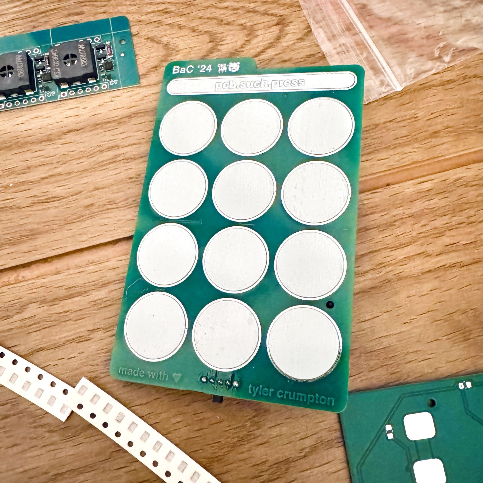 Front of the BaC '24 pcb.such.press badge